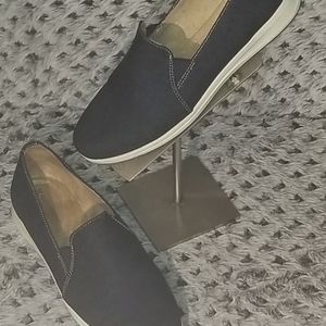 A nice pair of  dark jean fabric flats.